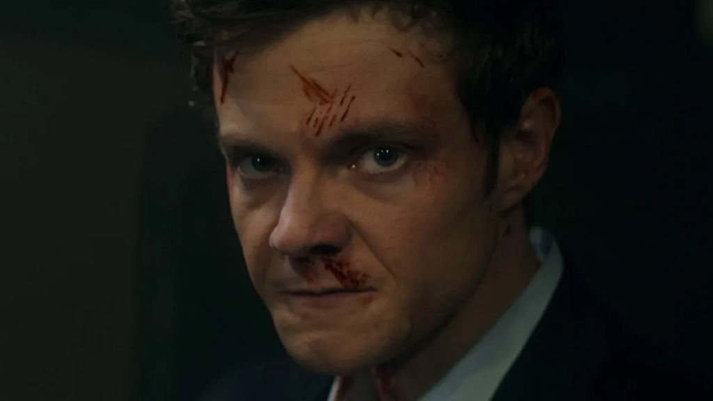 Jack Quaid interpreta Nathan Caine 